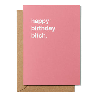 Pink greeting card with white text that says Happy Birthday Bitch.