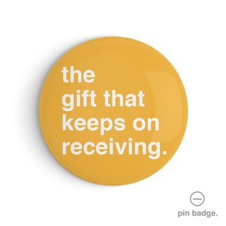 "The Gift That Keeps On Receiving" Pin Badge