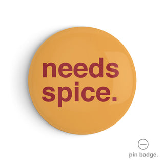 "Needs Spice" Pin Badge