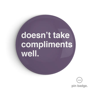 "Doesn't Take Compliments Well" Pin Badge